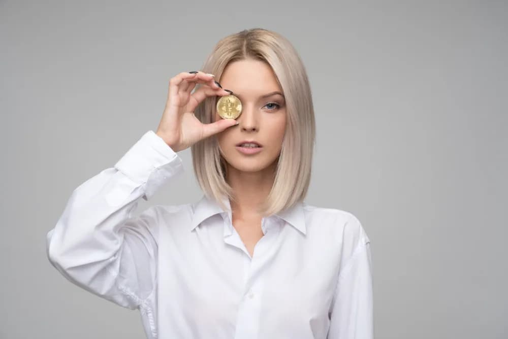 Investor holding a crypto coin