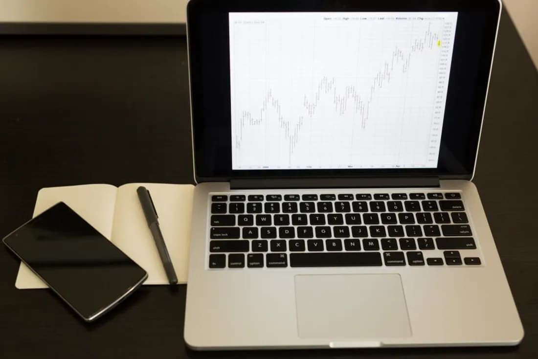 Laptop showing a market chart